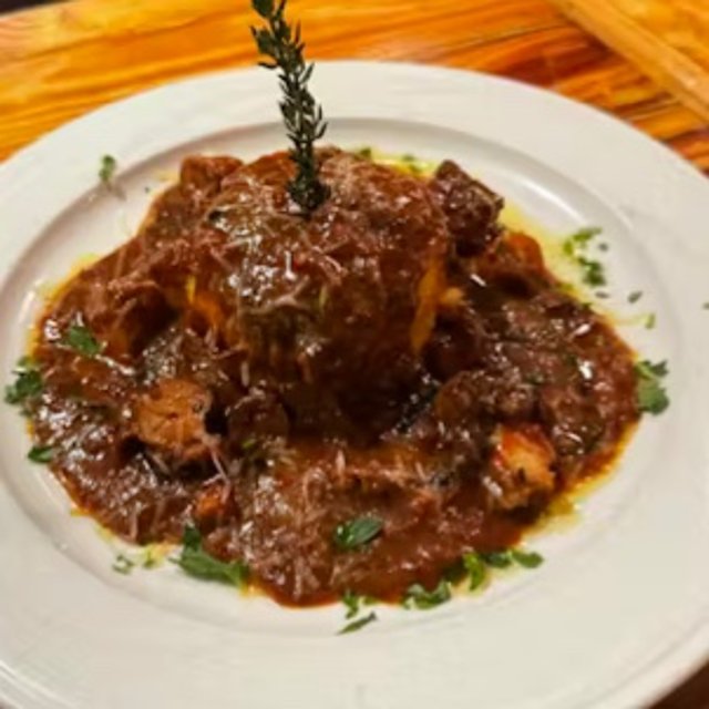Polenta al Sugo Polpo e Porcini.