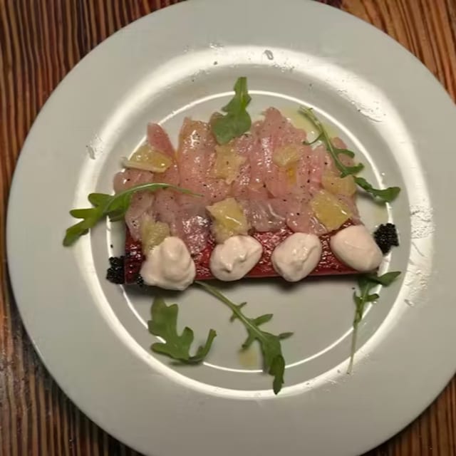 Carpaccio Di Pesce Berice Saltato Con Anguria, Maionese, Alle Alici E Con Scorza Di Limone Candita, Olio E Erbe.